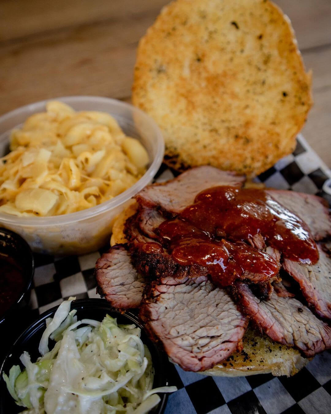 Sliced brisket plate with mac & cheese and coleslaw